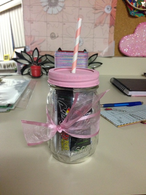 Mason Jar Glass filled with drink mixes. Given to Jenna